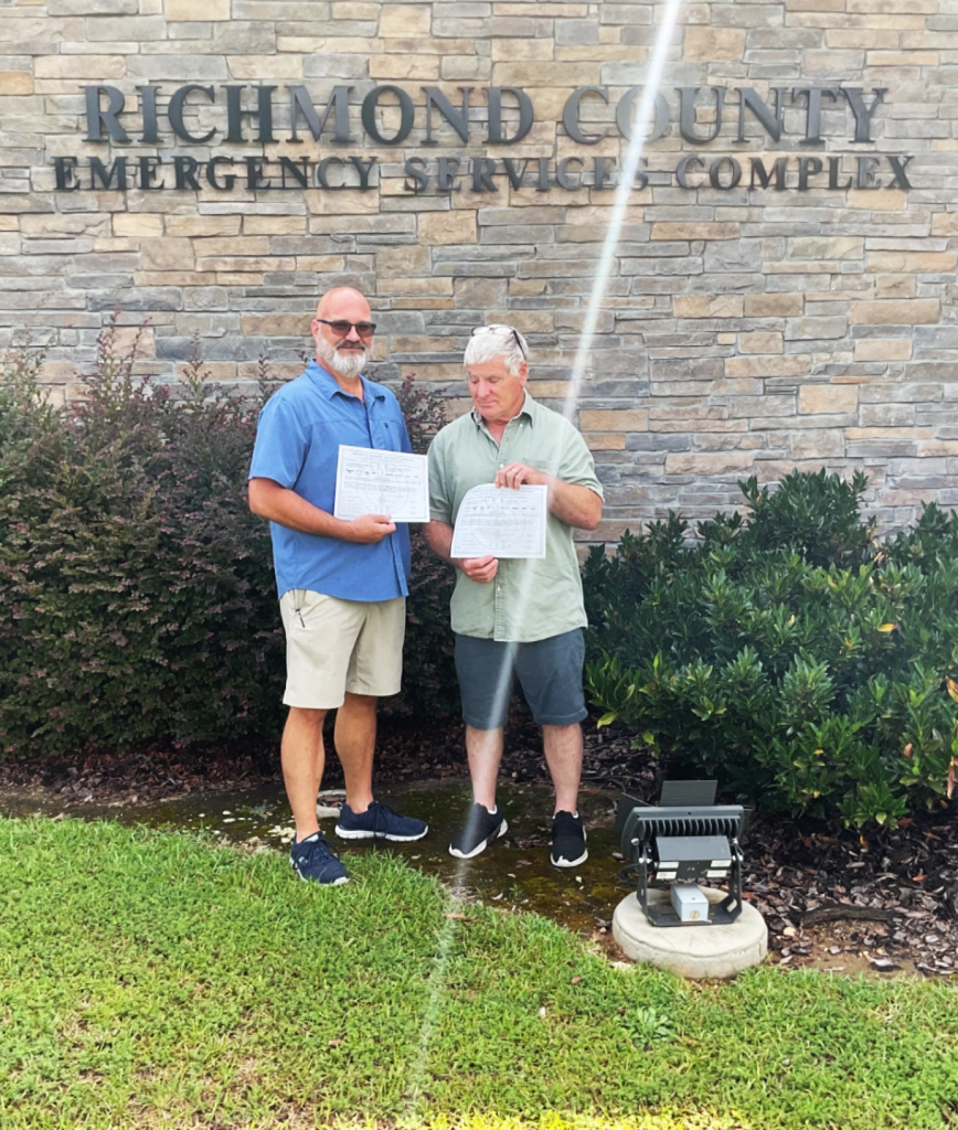 Ron Adams KW4RON up to General & friend, Thomas Fisher (KQ4UAC) new tech holding up their certificates of successfully completed examination.