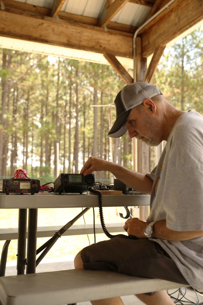 Ted Lathan, KB4CIT, working the Icom 706MiiG with a sound module, club field day, June 29, 2024